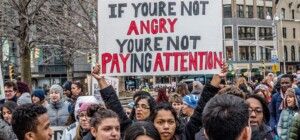 guy-standings-the-precariat